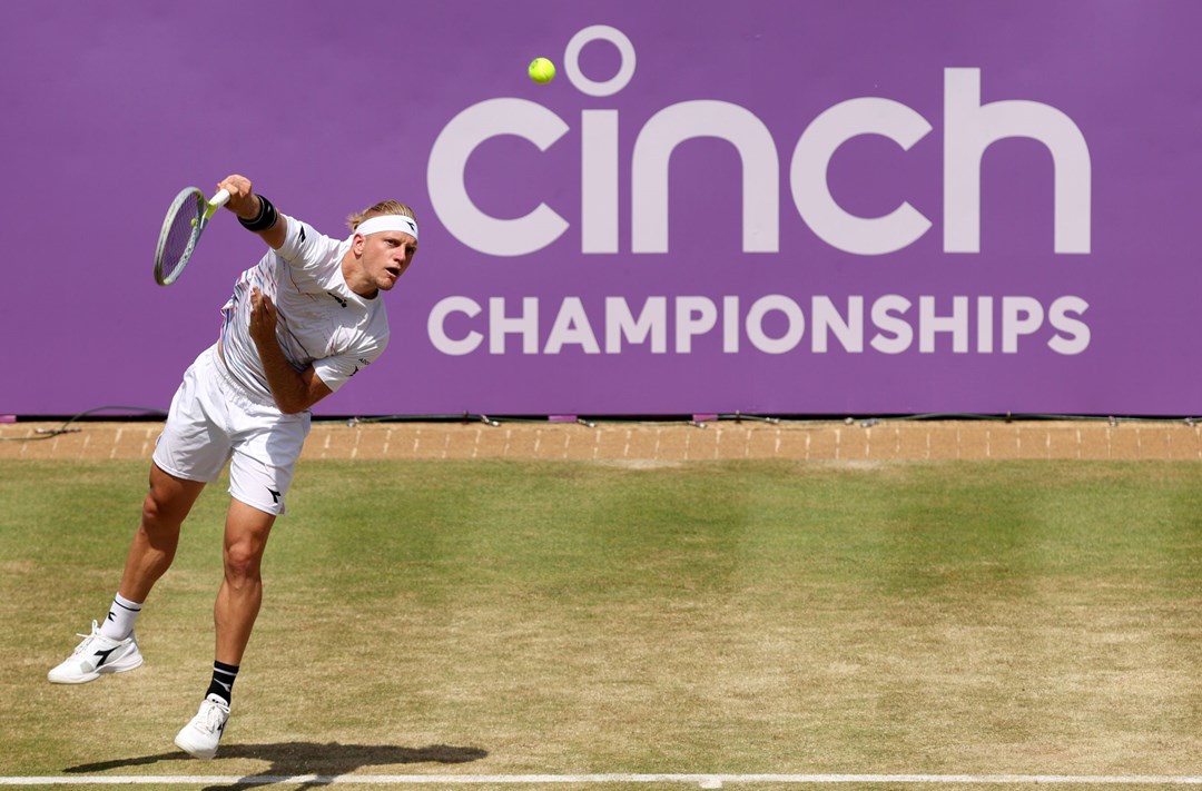 Davidovich Fokina hitting a serve at Queen's