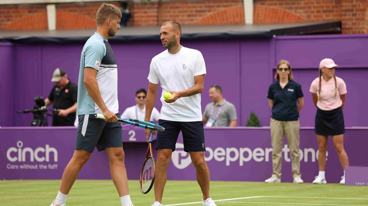 Lloyd Glasspool stood beside Dan Evans on court at the cinch Championships