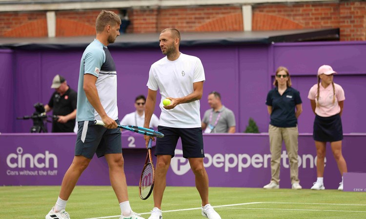 Lloyd Glasspool stood beside Dan Evans on court at the cinch Championships
