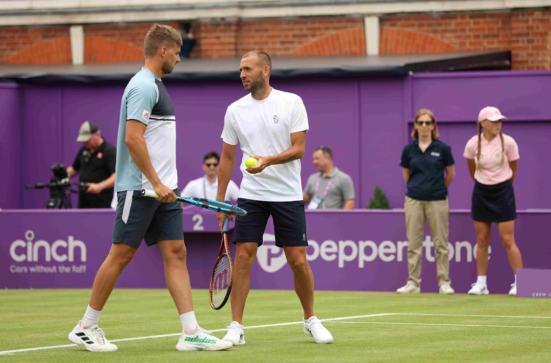 Lloyd Glasspool stood beside Dan Evans on court at the cinch Championships