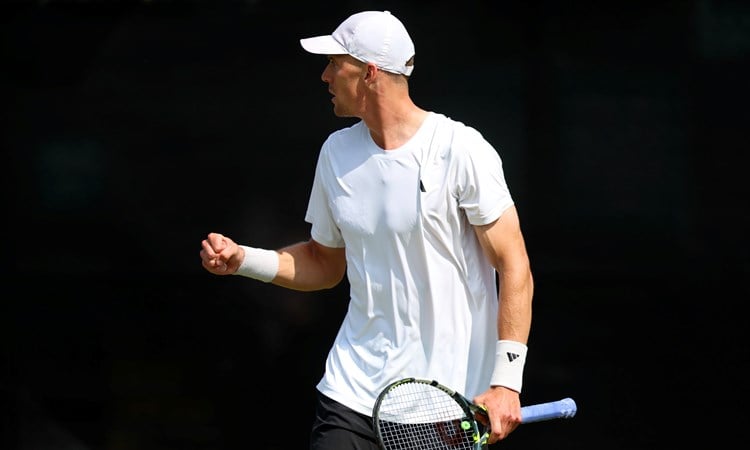 Jan Choinski gives a fist pump celebration at the Lexus Nottingham Open