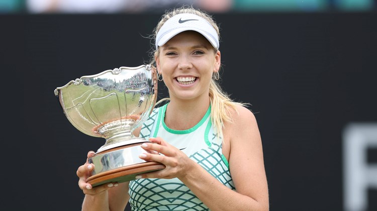 Katie Boulter holding her Rothesay Open Nottingham trophy on Centre Court