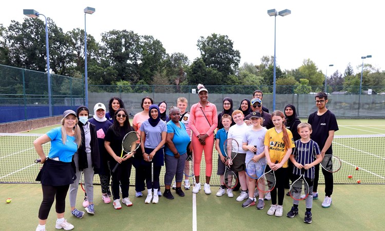 Venus Williams pictured with community groups on the practice courts at the 2023 Rothesay Classic Birmingham