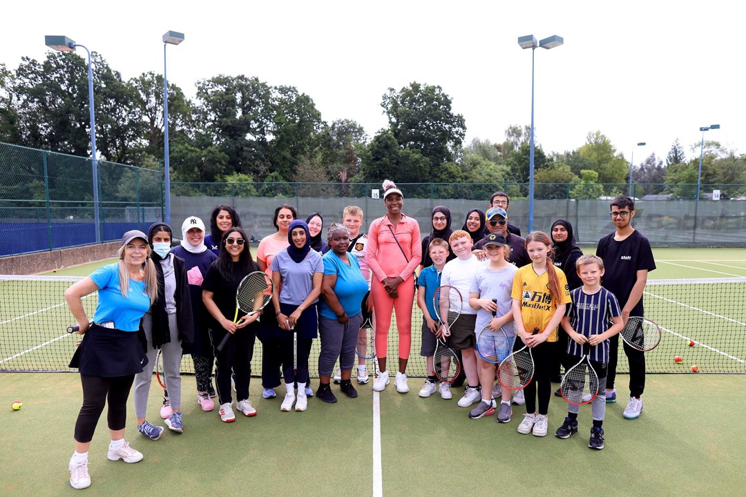 Venus Williams pictured with community groups on the practice courts at the 2023 Rothesay Classic Birmingham