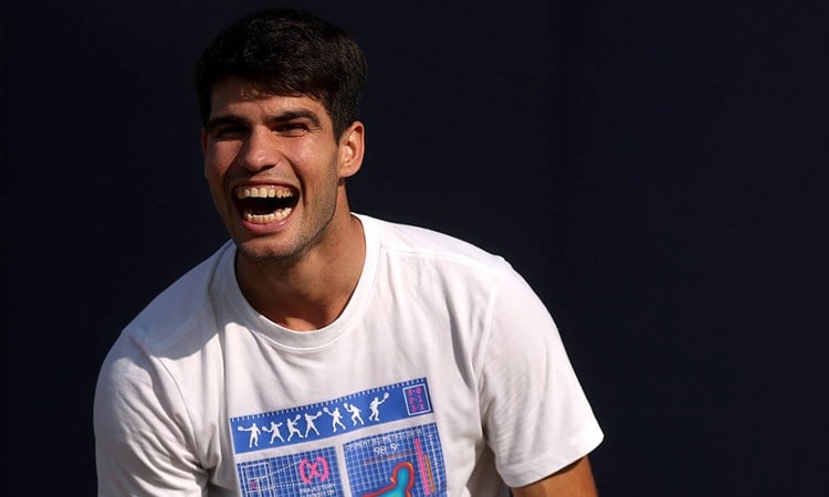 Carlos Alcaraz laughing behind-the-scenes at the HSBC Championships