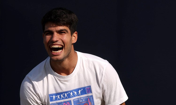 Carlos Alcaraz laughing behind-the-scenes at the HSBC Championships