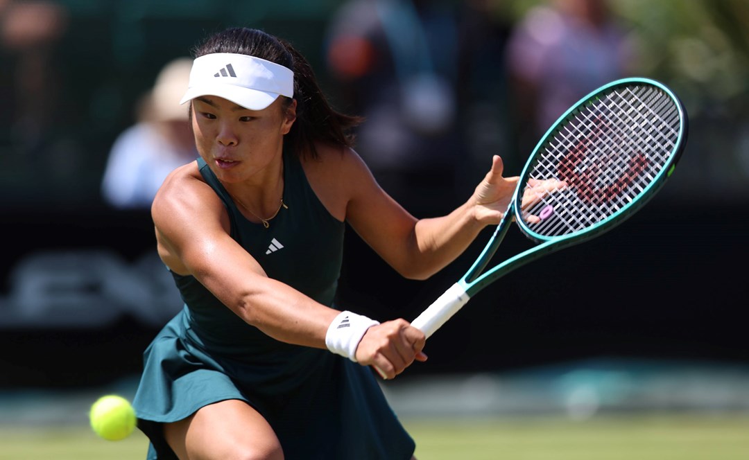 Mimi Xu hitting a backhand slice in the second round of the Lexus Nottingham Open