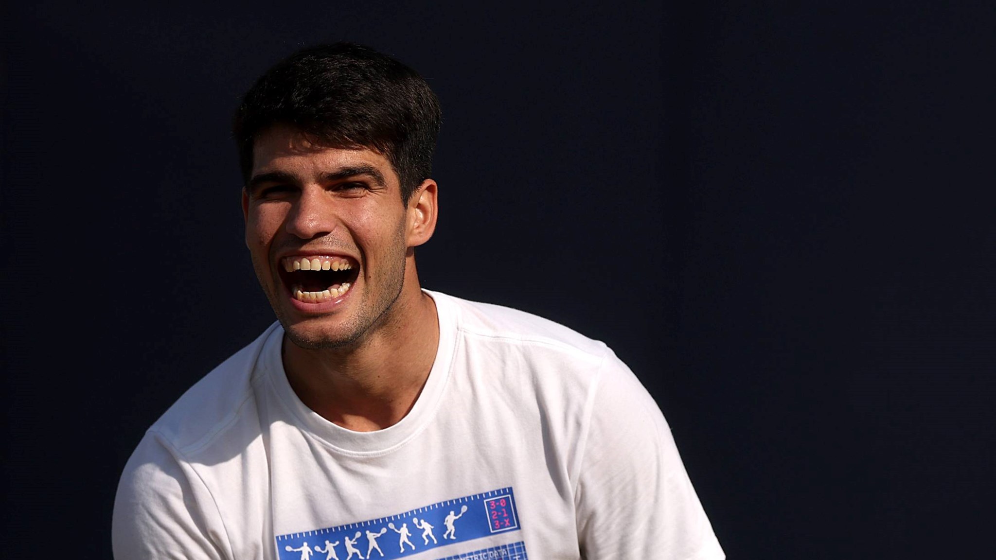 Carlos Alcaraz laughing behind-the-scenes at the HSBC Championships