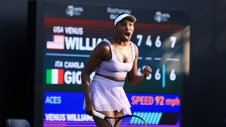 Venus Williams celebrating winning match point in her opening round match against Camilla Giorgi at the 2023 Rothesay Classic Birmingham. 