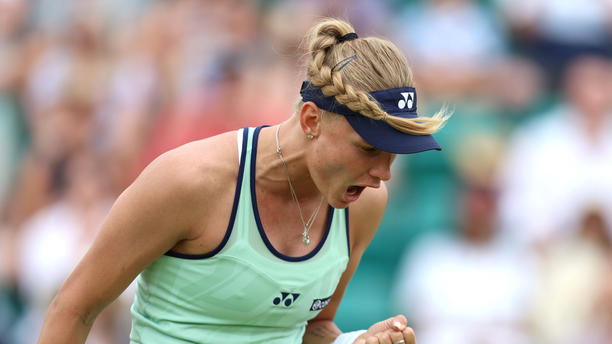 Dayana Yastremska roars and pumps her fist in celebration at the Lexus Nottingham Open