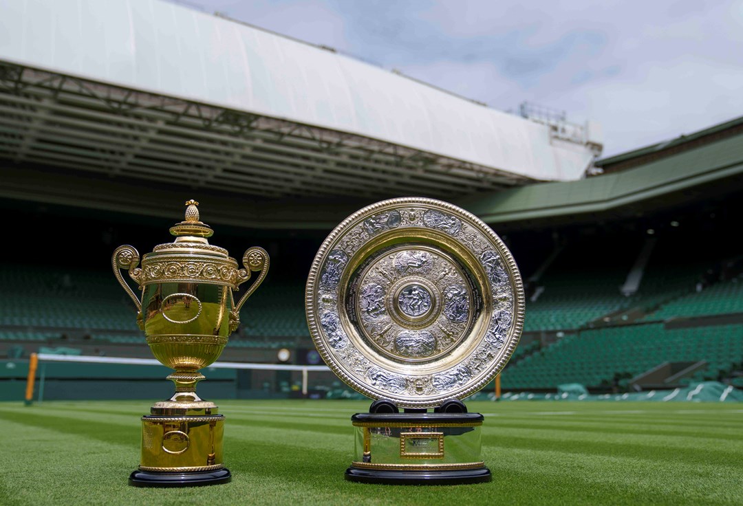 The men's singles and women's singles Wimbledon trophies