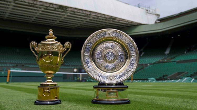 The men's singles and women's singles Wimbledon trophies