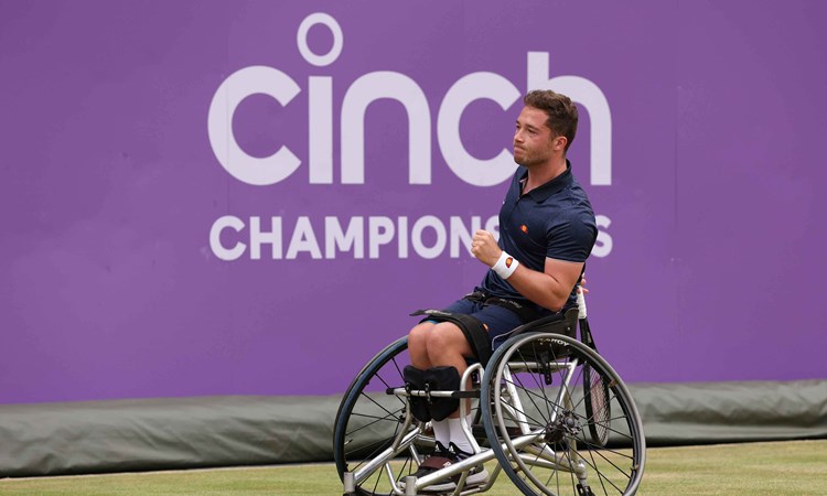 Alfie Hewett, a wheelchair tennis player, clenching his fist in celebration on court at the cinch Championships