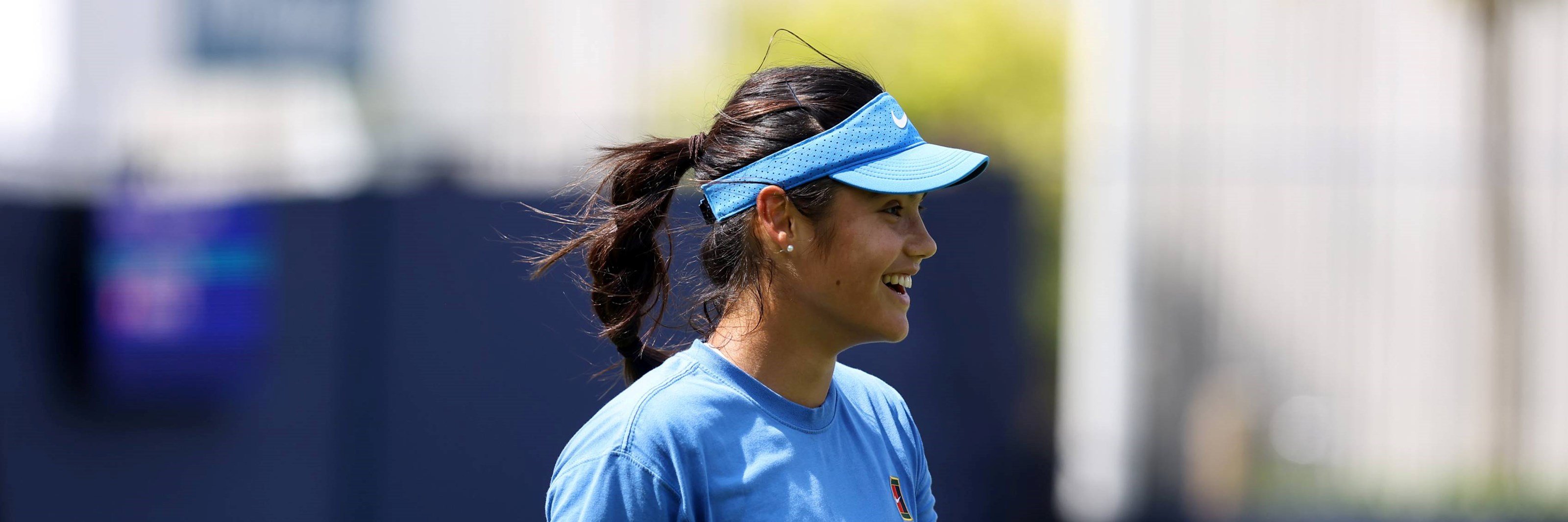 Emma Raducanu s,iling during practice at the Lexus Eastbourne Open