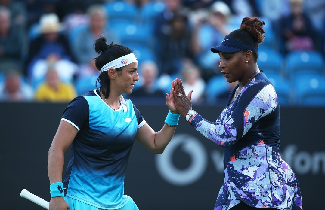 Serena Williams and Ons Jabeur high five in Eastbourne