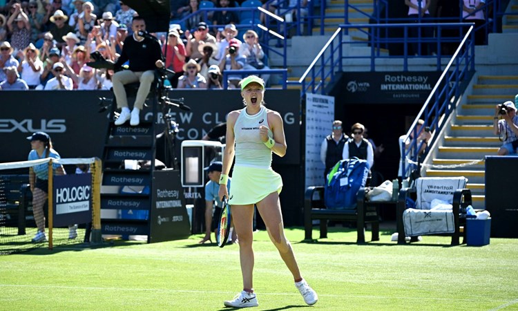 Harriet Dart cheers on court after beating Marie Bouzkova in Eastbourne