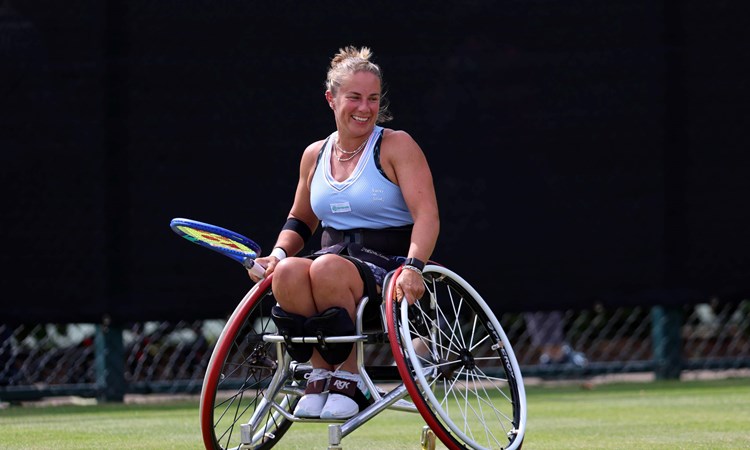 Lucy Shuker laughs on court at the Lexus Notingham Open