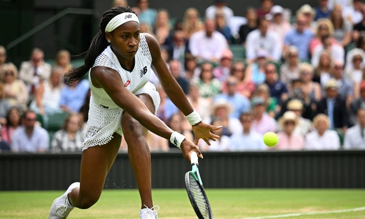 Coco Guaff reaches for a forehand at Wimbledon 2022