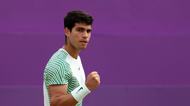 Carlos Alcaraz clenching his fist in celebration after winning his semi-final match against Sebastian Korda