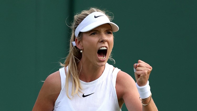 Katie Boulter gives a fist pump in celevration during a first round win at Wimbledon
