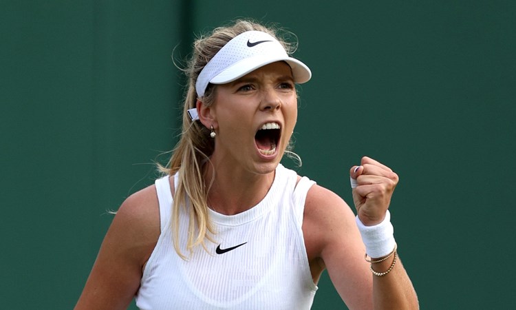 Katie Boulter gives a fist pump in celevration during a first round win at Wimbledon