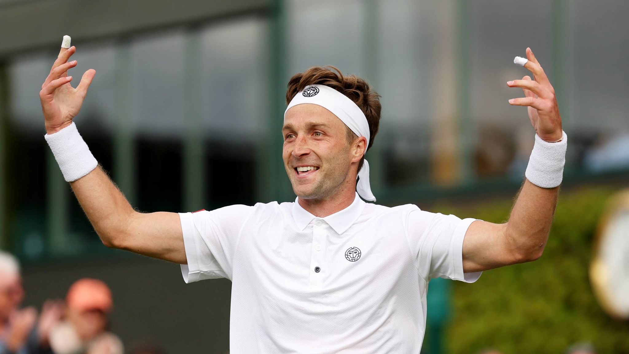 Liam Broady celebrates a first round win at Wimbledon 2023