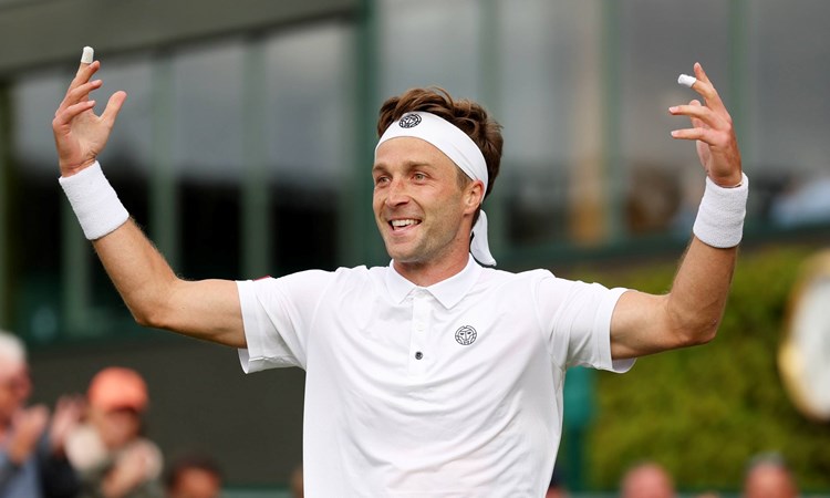 Liam Broady celebrates a first round win at Wimbledon 2023
