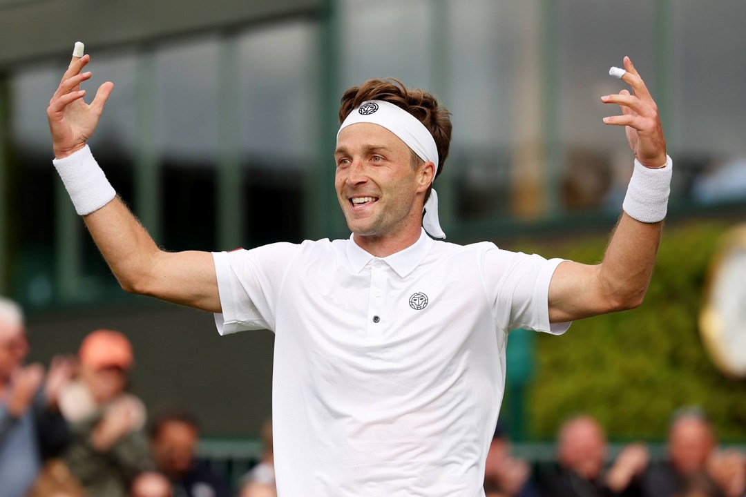 Liam Broady celebrates a first round win at Wimbledon 2023