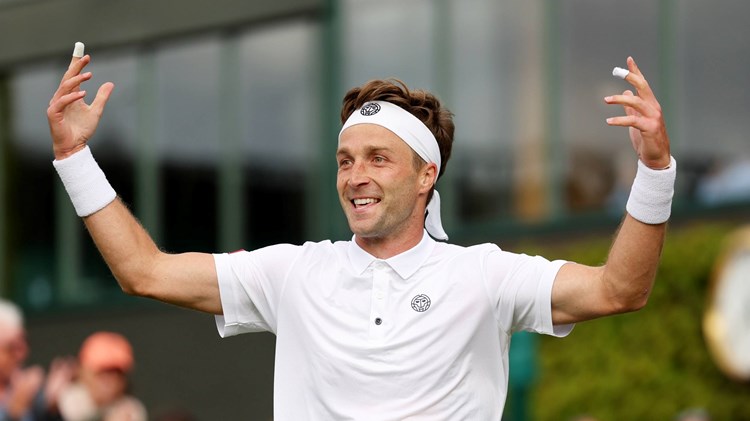 Liam Broady celebrates a first round win at Wimbledon 2023