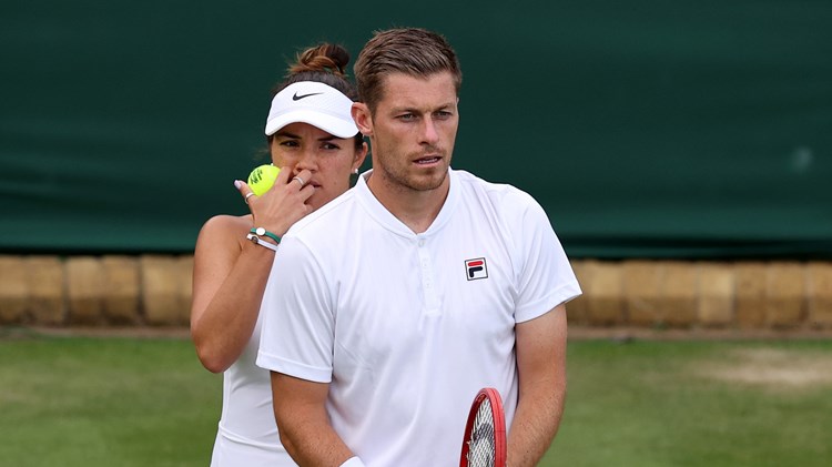 Neal Skupski and Desirae Krawczyk during their Mixed Doubles First Round match on day six of The Championships Wimbledon 2022 