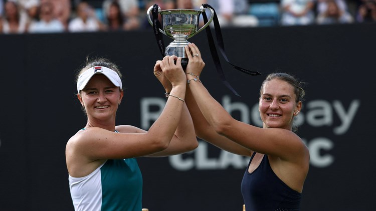 Barbora Krejcikova and Marta Kostyuk with the Rothesay Classic Birmingham women's doubles title