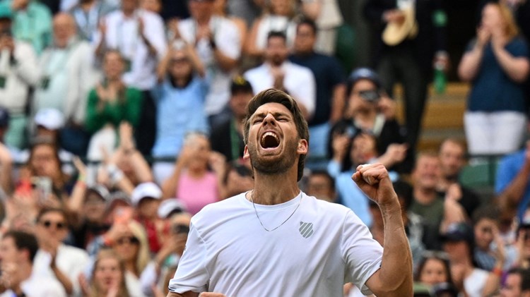 Cam Norrie cheers his fourth round win at Wimbledon