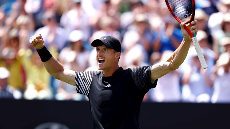 Billy Harris shouting while holding his arms up in the air after winning his quarter-final match at Rothesay International Eastbourne
