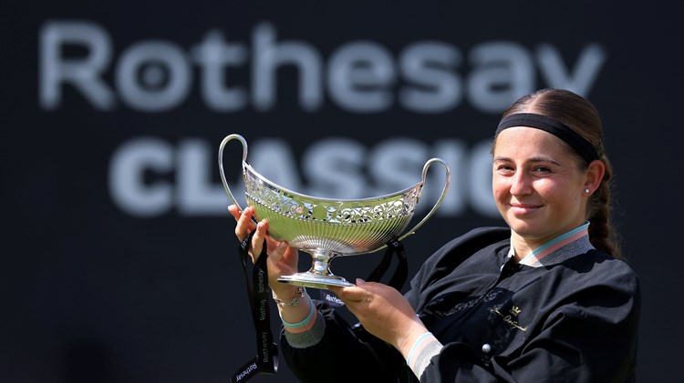elena Ostapenko of Latvia holds the Maud Watson Trophy after winning against Barbora Krejcikova of Czech Republic in the Women's Singles Final during day nine of the Rothesay Classic Birmingham at Edgbaston Priory Club 