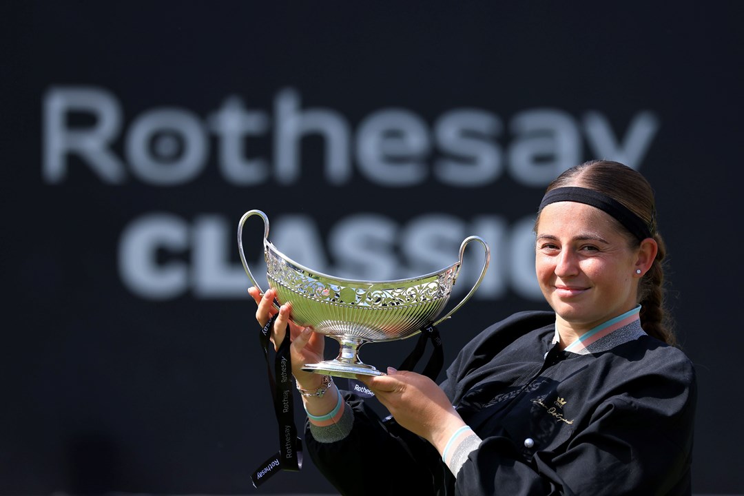 elena Ostapenko of Latvia holds the Maud Watson Trophy after winning against Barbora Krejcikova of Czech Republic in the Women's Singles Final during day nine of the Rothesay Classic Birmingham at Edgbaston Priory Club
