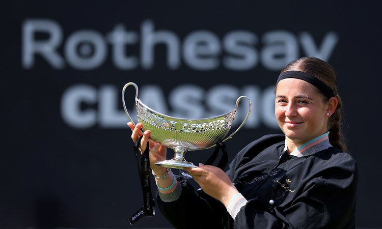 elena Ostapenko of Latvia holds the Maud Watson Trophy after winning against Barbora Krejcikova of Czech Republic in the Women's Singles Final during day nine of the Rothesay Classic Birmingham at Edgbaston Priory Club 