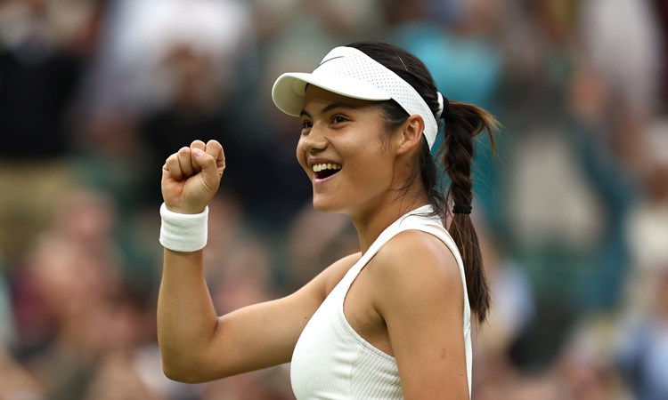 Emma Raducanu smiles after a second round win over Elise Mertens at Wimbledon