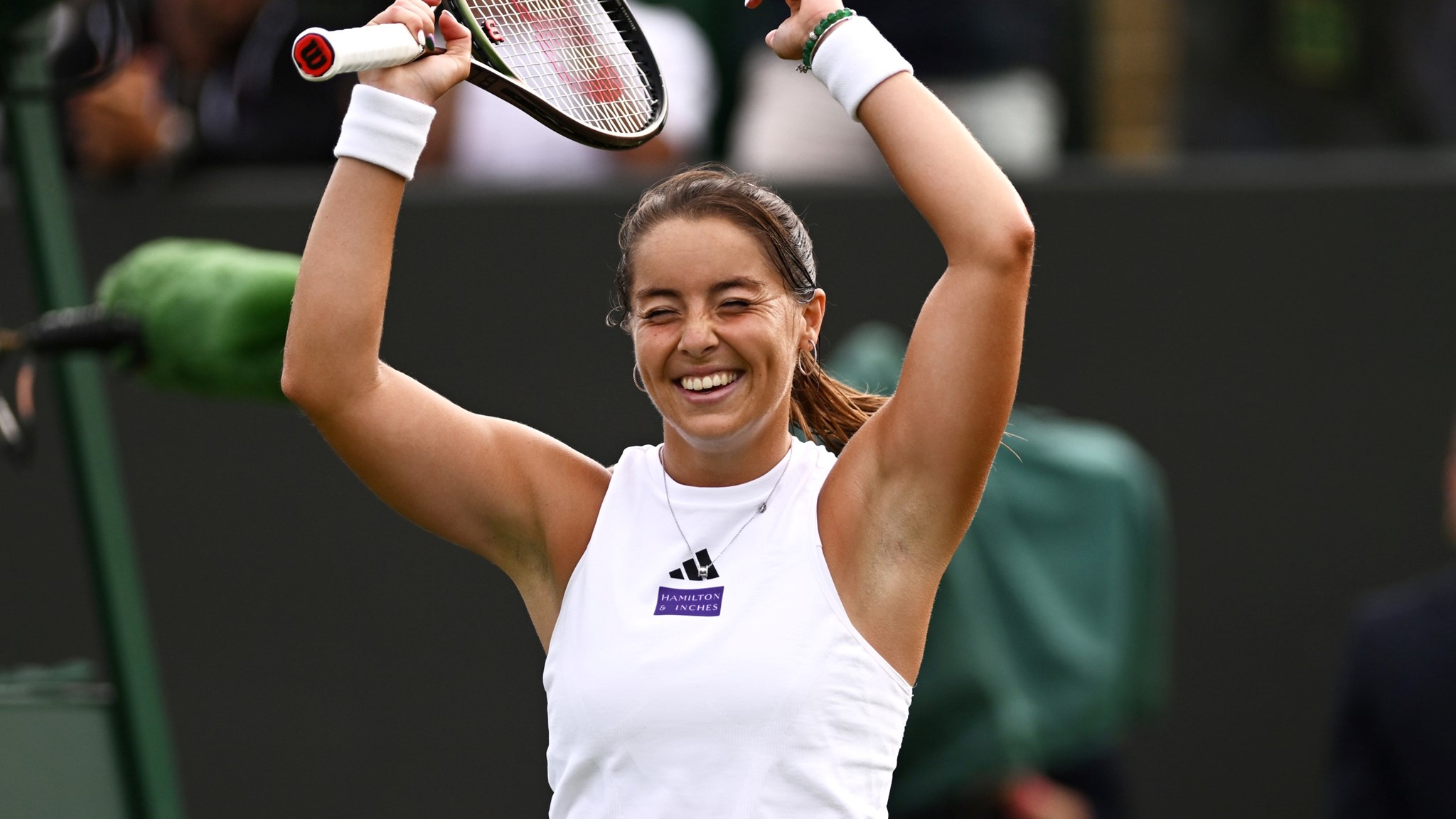 Jodie Burrage celebrating after achieving her first-ever Grand Slam win at SW19.