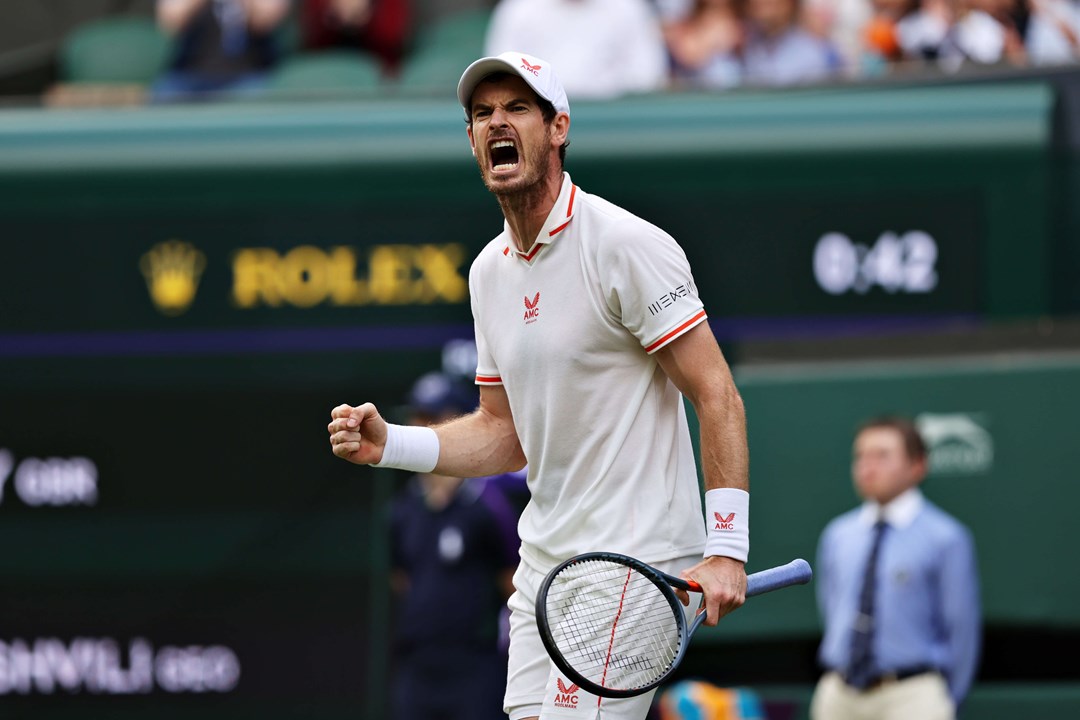 Andy Murray of Great Britain celebrates in his Men's Singles First Round match against Nikoloz Basilashvili of Georgia during Day One of The Championships - Wimbledon 2021