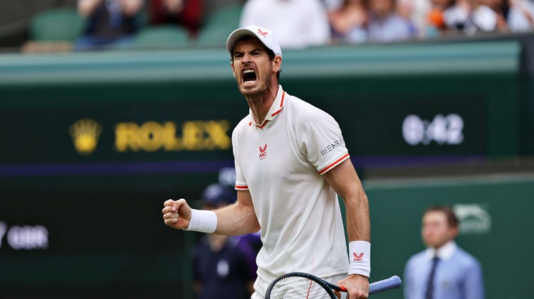 Andy Murray of Great Britain celebrates in his Men's Singles First Round match against Nikoloz Basilashvili of Georgia during Day One of The Championships - Wimbledon 2021