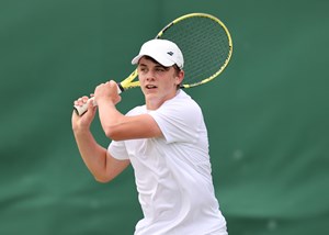 Hugo Coquelin hits a backhand at Junior Wimbledon