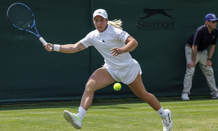Sonay Kartal (GBR) playing against Suzan Lamens (NED) in the first round of the Ladies’ Singles Qualifying Competition at the Wimbledon Qualifying and Community Sports Centre, Roehampton. The Championships 2024. Day -6 Tuesday 25/06/2024. 