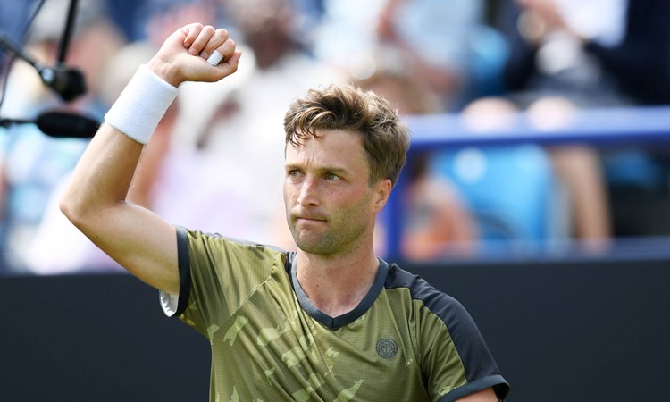 Liam Broady celebrates his first round win at the Rothesay International Eastbourne