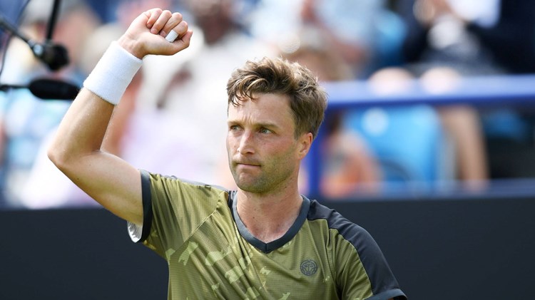 Liam Broady celebrates his first round win at the Rothesay International Eastbourne