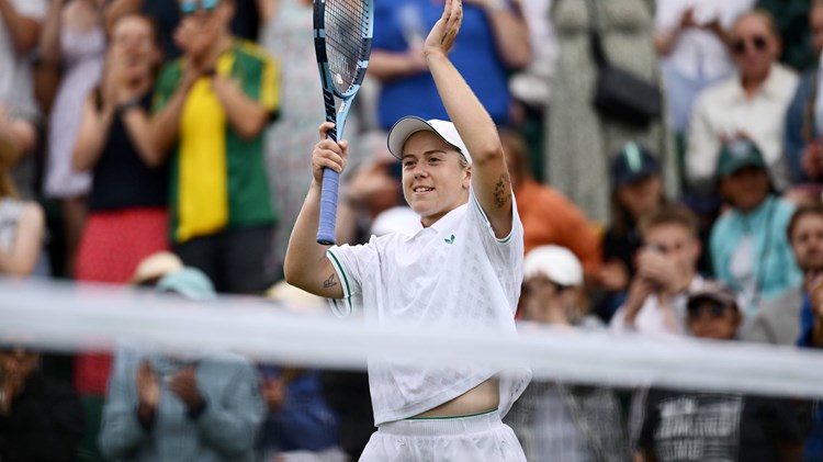 Sonay Kartal applauds the crowd after winning in the second round at Wimbledon