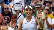 Lily Miyazaki waves to the camera after winning the first round of Wimbledon qualifiers
