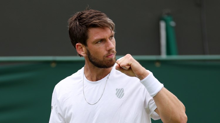 Cam Norrie fist pumps in his first round match in Wimbledon