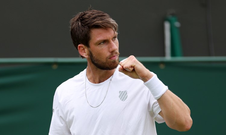 Cam Norrie fist pumps in his first round match in Wimbledon