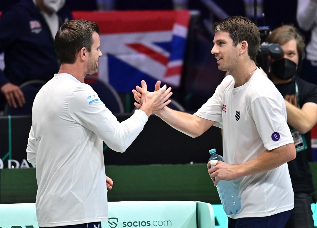 Great Britain's Cameron Norrie is congratulated by Great Britain's Davis Cup captain Leon Smith after he defeated France's Arthur Rinderknech in the men's singles group stage match between France and Great Britain of the 2021 Davis Cup tennis tournament