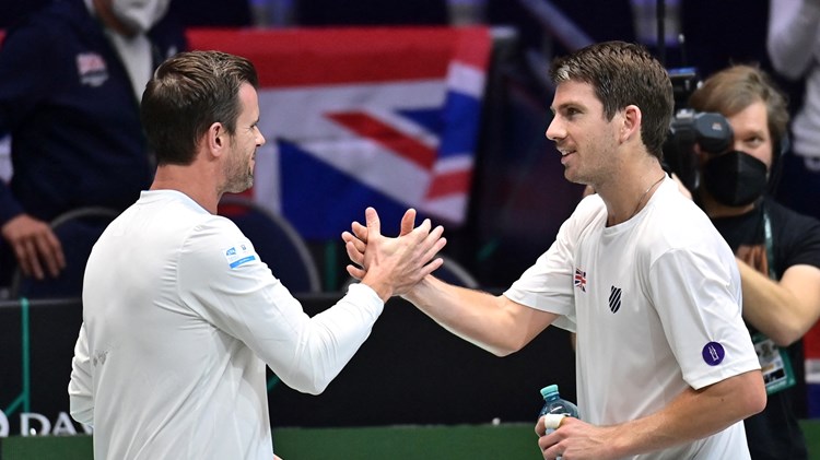 Great Britain's Cameron Norrie is congratulated by Great Britain's Davis Cup captain Leon Smith after he defeated France's Arthur Rinderknech in the men's singles group stage match between France and Great Britain of the 2021 Davis Cup tennis tournament